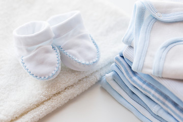 Image showing close up of baby boys clothes for newborn on table