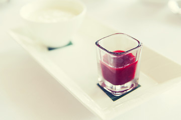 Image showing close up of yogurt and jam at restaurant