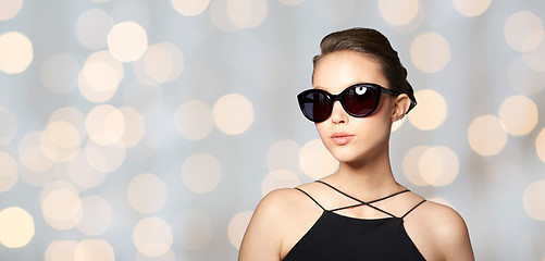 Image showing beautiful young woman in elegant black sunglasses