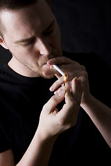 Image showing man smoking a cigarette