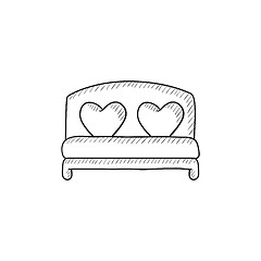 Image showing Heart shaped pillows on bed sketch icon.