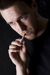 Image showing man smoking a cigarette