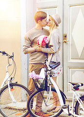 Image showing couple with bicycles in the city