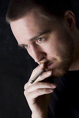 Image showing man smoking a cigarette