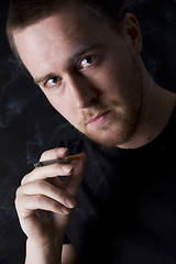 Image showing man smoking a cigarette