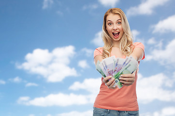 Image showing happy young woman with euro cash money