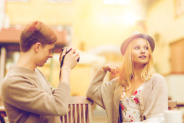 Image showing couple taking photo picture in cafe