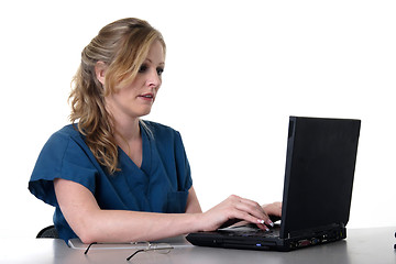 Image showing Medical assistant working on laptop