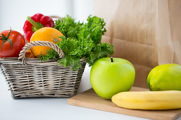 Image showing basket of fresh friuts and vegetables at kitchen