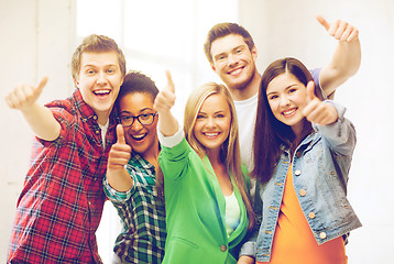 Image showing students showing thumbs up at school