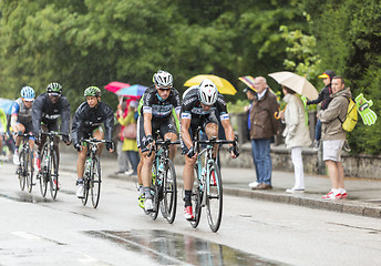 Image showing Group of Cyclists Riding in the Rain - Tour de France 2014