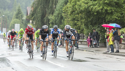 Image showing Group of Cyclists Riding in the Rain - Tour de France 2014