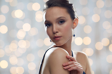 Image showing beautiful young asian woman with earring