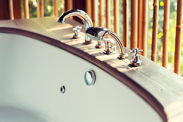 Image showing close up of bathtub at exotic asian hotel