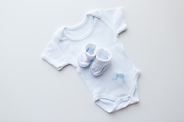 Image showing close up of baby boys clothes for newborn on table