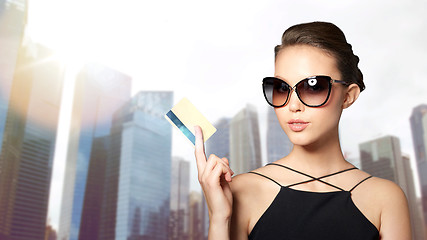 Image showing beautiful young woman in elegant black sunglasses