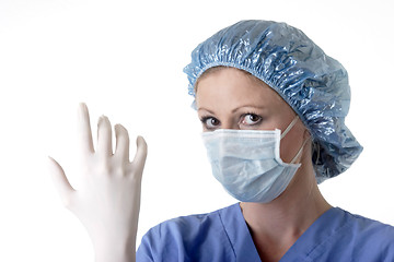 Image showing Lady surgeon getting prepped for surgery