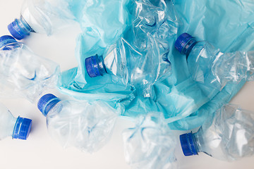 Image showing close up of used plastic bottles and rubbish bag