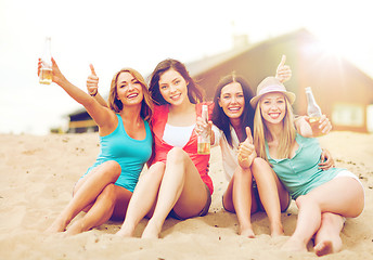 Image showing girls with drinks on the beach