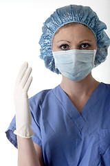 Image showing Lady surgeon getting ready for surgery