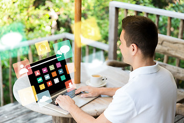 Image showing close up of businessman with laptop on terrace