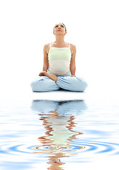 Image showing padmasana lotus pose on white sand #2