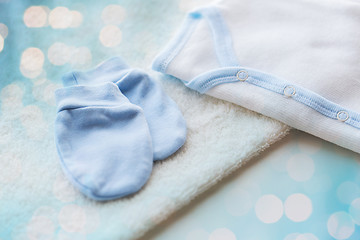 Image showing close up of baby boys clothes for newborn on table