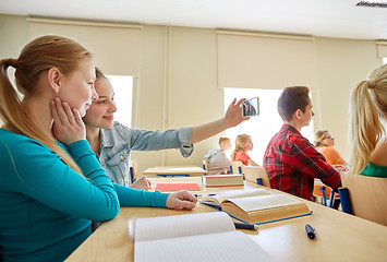 Image showing student girls taking smartphone selfie at school