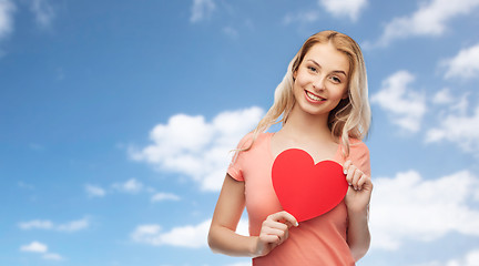 Image showing happy woman or teen girl with red heart shape