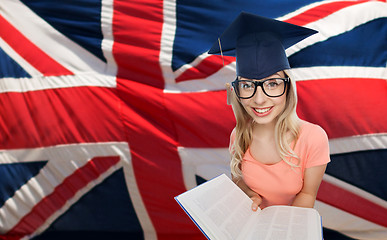 Image showing student woman in mortarboard over english flag