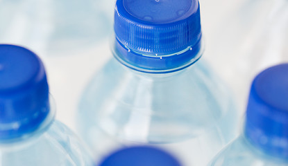 Image showing close up of plastic bottles with drinking water