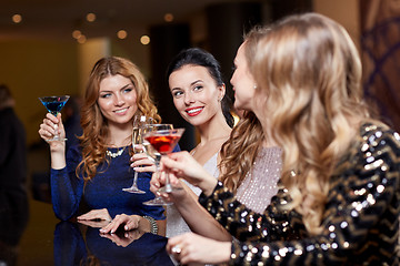 Image showing happy women with drinks at night club