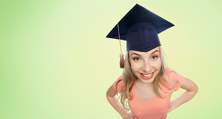 Image showing smiling young student woman in mortarboard