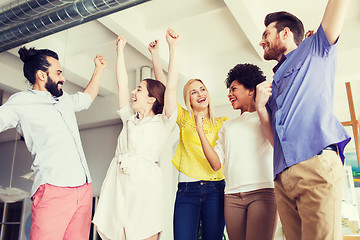 Image showing happy creative team in office