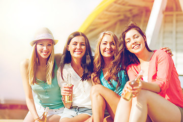 Image showing girls with drinks on the beach