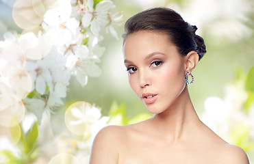 Image showing close up of beautiful woman face with earring