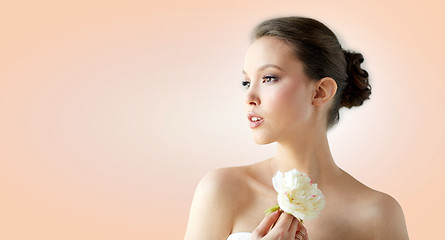 Image showing beautiful asian woman with flower and jewelry