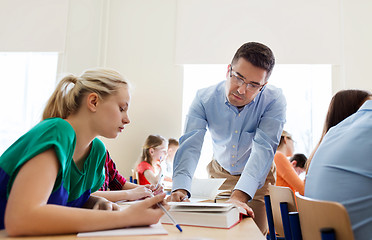 Image showing group of students and teacher at school classroom