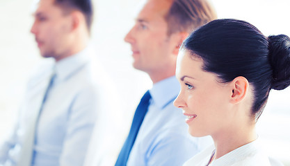 Image showing businessmen and businesswomen on conference