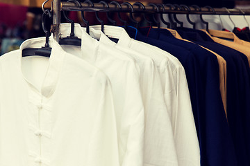 Image showing male shirts on hanger at asian street market