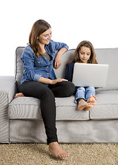 Image showing Mother teaching her little daughter