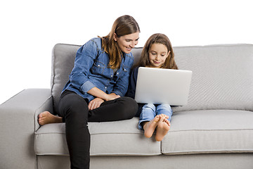 Image showing Mother teaching her little daughter