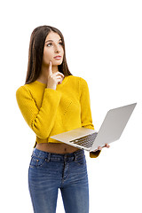 Image showing Girl working with a laptop