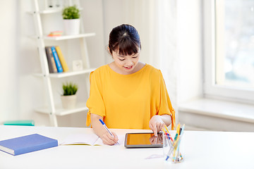 Image showing asian woman student with tablet pc at home