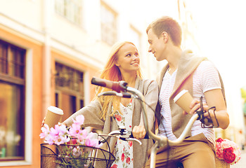 Image showing couple with bicycles in the city