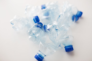 Image showing close up of empty used plastic bottles on table