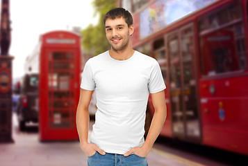 Image showing man in blank white t-shirt over london city street