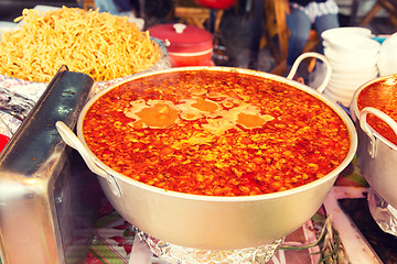 Image showing pot of spicy soup at street market