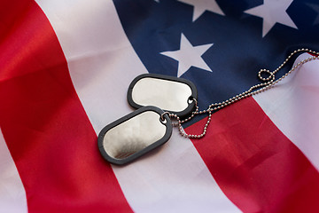 Image showing close up of american flag and military badges
