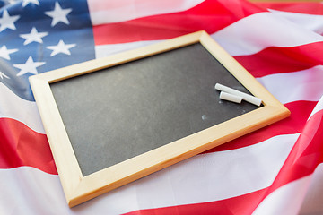 Image showing close up of school blackboard on american flag